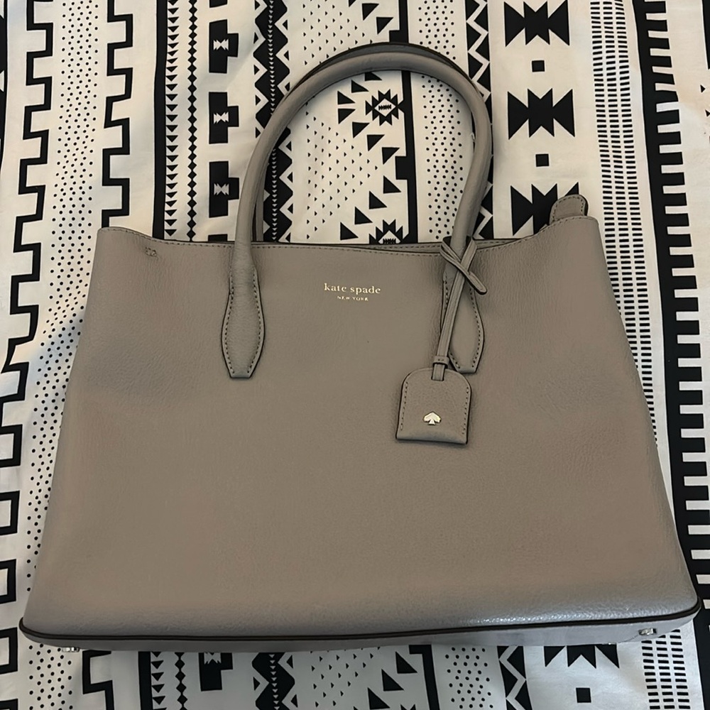 Gently used grey Kate Spade Purse